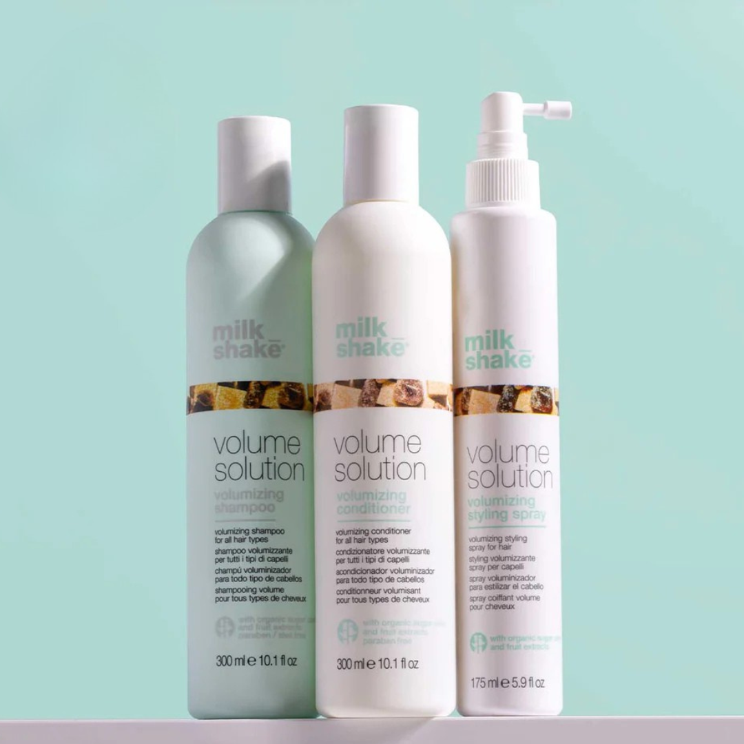 Milk_Shake Volume Solution Styling Spray shown with the rest of the range